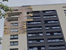 Фасад дома, пострадавшего от удара беспилотника в Воронеже, начали восстанавливать: фото  