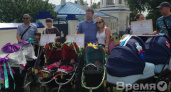 На параде колясок в Воронеже родителям двойняшек и тройняшек вручили сертификаты по сто и 50 тысяч рублей